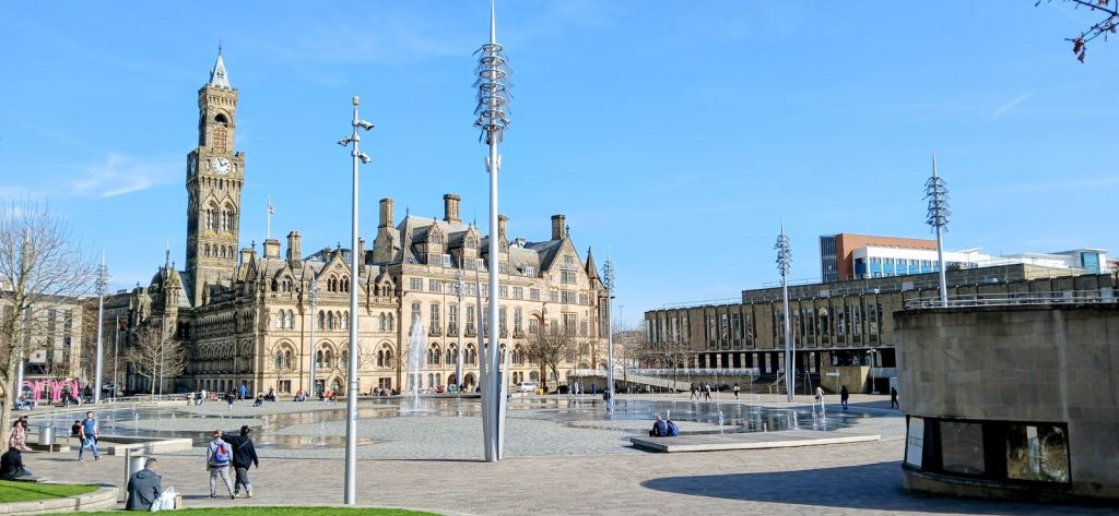 Cityscape with buildings and blue sky. Bradford City Hall - filming location